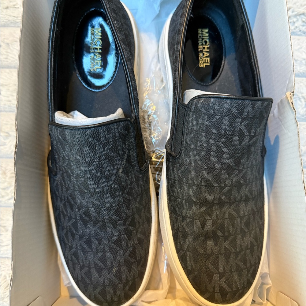 Michael Kors Monogram Black Slip-On sneakers size 9 womens lightly worn